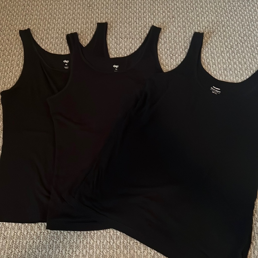 Bundle of black layering tanks